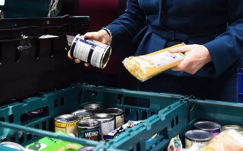 Food banks: Alston raised concerns about the impact of universal credit - Credit: Andy Buchanan/PA