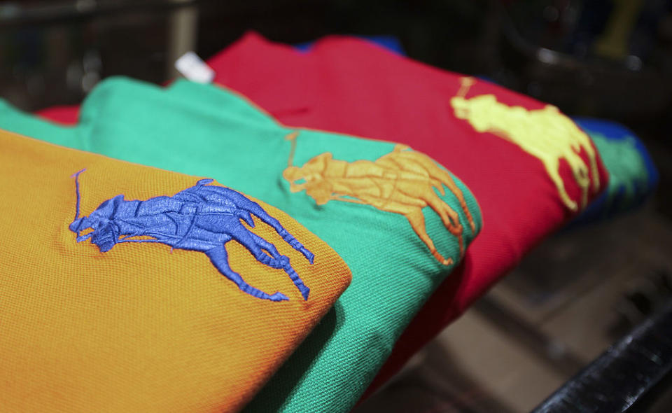 Polo shirts sit on display at the Ralph Lauren store in London, U.K., on Thursday, Nov. 11, 2010
