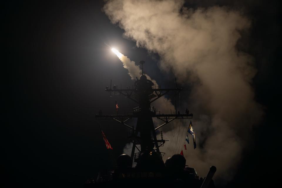 The guided-missile destroyer USS Gravely launches Tomahawk Land Attack Missiles in response to increased Iranian-backed Houthi malign behavior in the Red Sea Jan. 12, 2024.