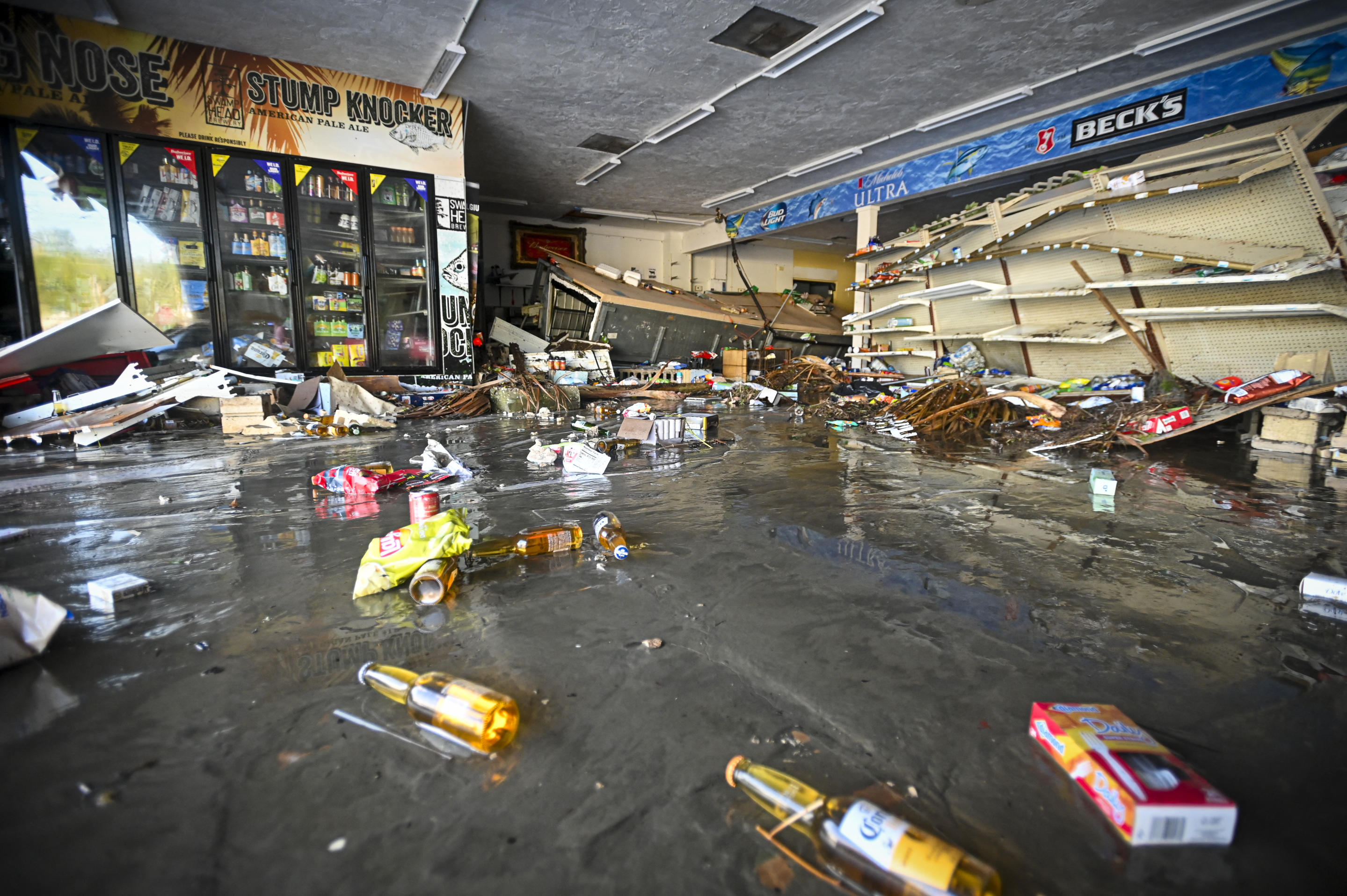 Debris remains at a flooded store after Hurricane Helene made landfall in Cedar Key, Florida, on September 27, 2024. (Miguel J. Rodriguez Carrillo/AFP via Getty Images)