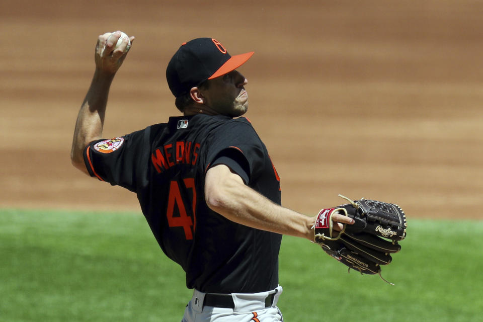 Baltimore Orioles starting pitcher John Means delivers a pitch against the Texas Rangers in the third inning during a baseball game on Sunday, April 18, 2021, in Dallas. (AP Photo/Richard W. Rodriguez)