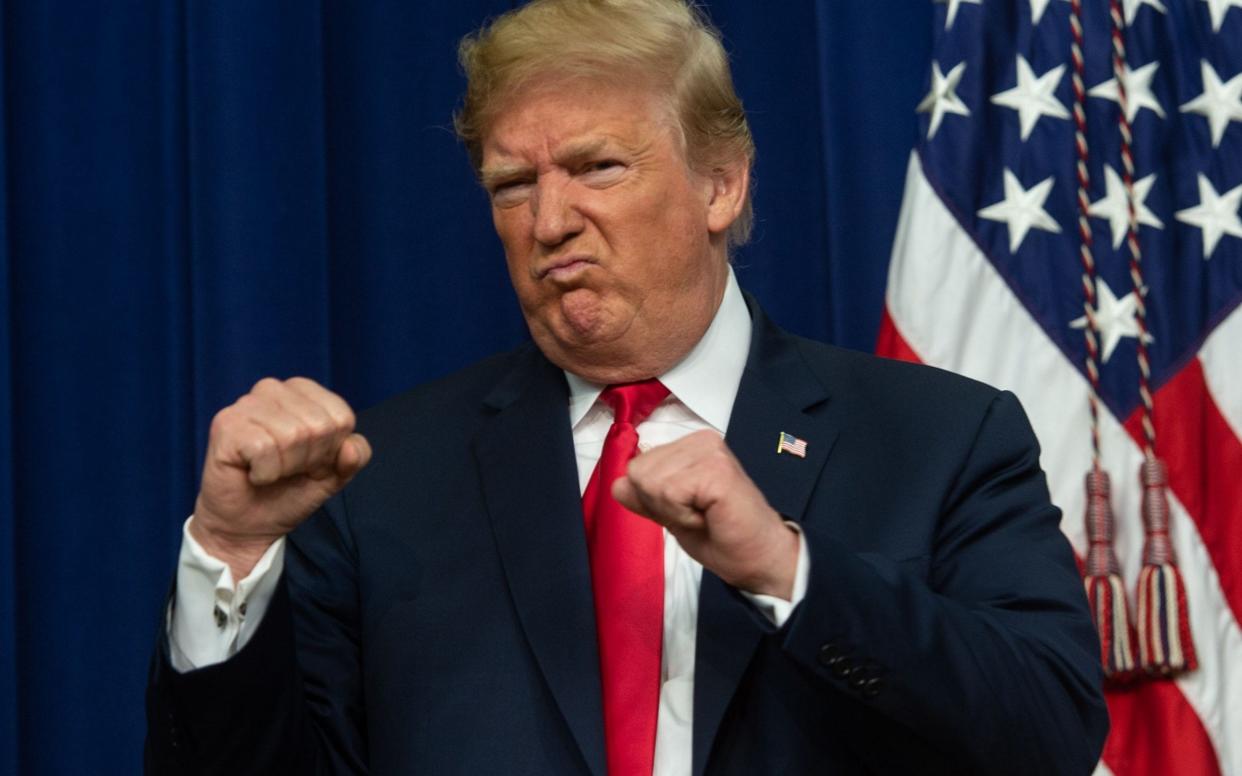 US President Donald Trump addresses an event at the White House in Washington last month - AFP