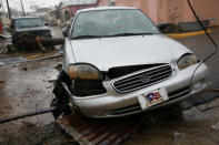 Damaged cars are seen after the area was hit by Hurricane Maria in Guayama, Puerto Rico September 20, 2017. REUTERS/Carlos Garcia Rawlins