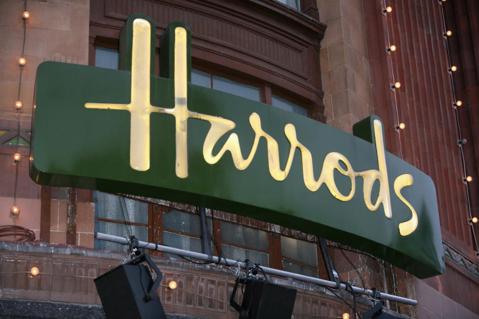 LONDON - NOVEMBER 01:  The Harrods sign is illuminated during the Christmas Parade to celebrate the opening of Santas Grotto at Harrods on November 1, 2008 in London, England.  (Photo by Tim Whitby/Getty Images)