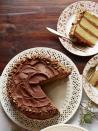 <p>If the mama-to-be is craving something sweet, you can't go wrong with this cake. It's made with chocolate-covered toffee bars and plenty of brown sugar - yum! </p><p><a rel="nofollow noopener" href="https://www.countryliving.com/food-drinks/recipes/a5919/toffee-crunch-cake-recipe-clx1114/#" target="_blank" data-ylk="slk:Get the recipe from Country Living.;elm:context_link;itc:0;sec:content-canvas" class="link ">Get the recipe from <em>Country Living</em>. </a></p>