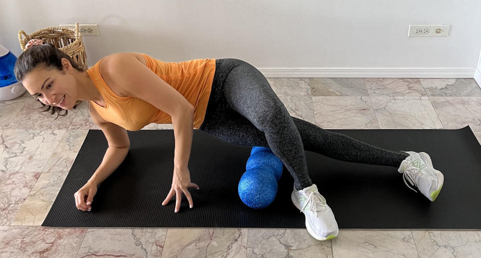 Outer thigh foam roller exercise