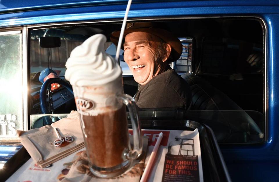 Mike Vaile gets ready to enjoy a root beer float at A&W on 14th and H streets Sept. 15, 2017 in Modesto, Calif. as he sits in his 1957 Chevy.
