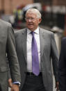 Former Manchester United manager Sir Alex Ferguson arrives at Manchester Crown Court where his former player Ryan Giggs is on trial accused of controlling and coercive behaviour against ex-girlfriend Kate Greville, in Manchester, England, Friday, Aug. 19, 2022. Giggs is also charged with assaulting Ms Greville and causing her actual bodily harm at his home in Worsley, Greater Manchester, on Nov. 1, 2020 and common assault against her younger sister, Emma, in the alleged same incident. (Peter Byrne/PA via AP)