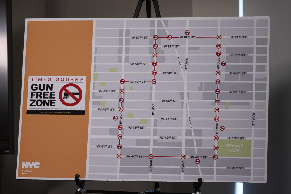 A map shows the locations of “Gun Free Zone" signs at Times Square is seen during a news conference, Wednesday, Aug. 31, 2022, in New York. (AP Photo/Yuki Iwamura)