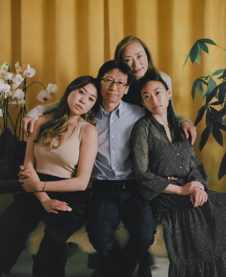 <strong>'HE ISN'T A VICTIM.' </strong>Carl Chan, center, sits with his daughters Crystal Chan, right, and Emerald Chan, left, and his wife Eleanore Tang, above, at home in Alameda, Calif., on May 18. As president of the Oakland Chinatown Chamber of Commerce, Carl, 62, has long made the protection of local elders a priority in his work. When attacks against Asian Americans started increasing in 2020, he ramped up his efforts, handing out whistles and air horns to anyone on the street who would take them. “We respect the elderly,” he says. “To me, to us, to our community, it is the worst when they are attacking our seniors.” Carl’s daughters worried about their father’s safety as he spent his time in areas where incidents of violence had taken place. “What he’s doing is so important,” Crystal, 28, remembers thinking. “While there is a risk, we just can’t keep thinking about that.” On April 29, when Carl was on his way to visit an older Asian man who had been assaulted on a bus, he also fell victim to an unprovoked attack. He remembers hearing a man screaming and yelling a racial slur. Then he describes “a quick punch to my head.” Crystal said the emotions overwhelmed her quickly; first shock, then anger and sadness. She and her sister, who live across the country in New York, flew home as soon as they could. “It’s not easy for our family, especially [when] the ones close to you become the victim,” Eleanore says. “It’s so hard. It’s so hard.” But Carl, scraped and bruised, emerged from the attack even more determined. On May 15, he walked side by side with his daughters and wife in a “Unity Against Hate” rally that he helped organize. “While he was physically assaulted, he isn’t a victim,” says Emerald, 24. “He’s showing that he’s strong.”<span class="copyright">Emanuel Hahn for TIME</span>