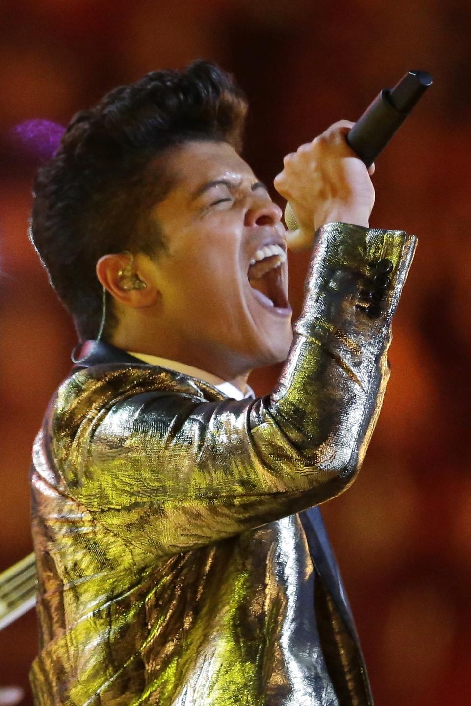 Bruno Mars performs during the halftime show of the NFL Super Bowl XLVIII football game Sunday, Feb. 2, 2014, in East Rutherford, N.J. (AP Photo/Julio Cortez)