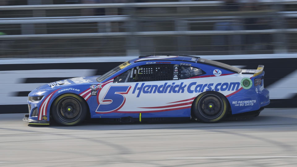 Kyle Larson (5) races in the NASCAR Cup Series auto race at Texas Motor Speedway in Fort Worth, Texas, Sunday, Sept. 24, 2023. (AP Photo/LM Otero)