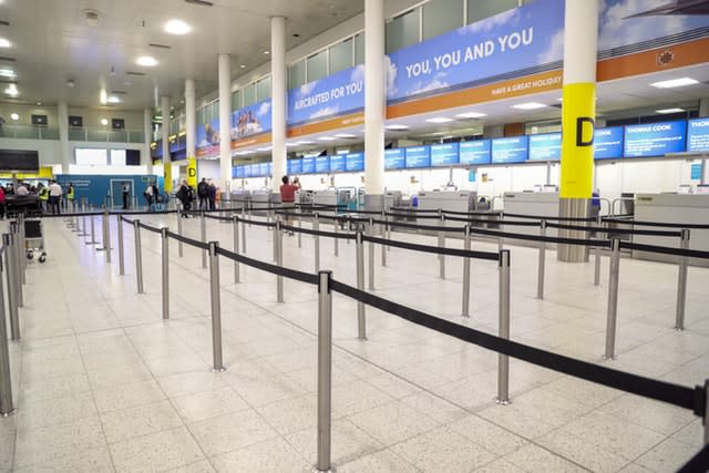 Empty Thomas Cook check-in desks at Gatwick Airport (Steve Parsons/PA)