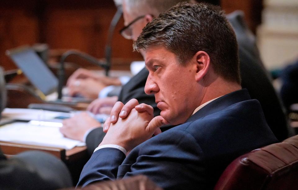 Wisconsin State Senator Eric Wimberger, republican from Green Bay, from district 30, listens while other senators debate during the senate session on Wednesday, June 14, 2023 in Madison. One of the main items on the agenda today was the local government funding bill.
