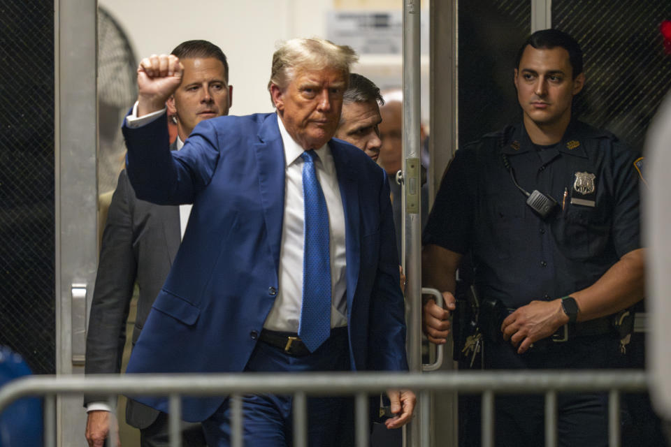 Former President Donald Trump returns from lunch to his trial at the Manhattan Criminal court, Monday, May 20, 2024, in New York. (Steven Hirsch/New York Post via AP, Pool)