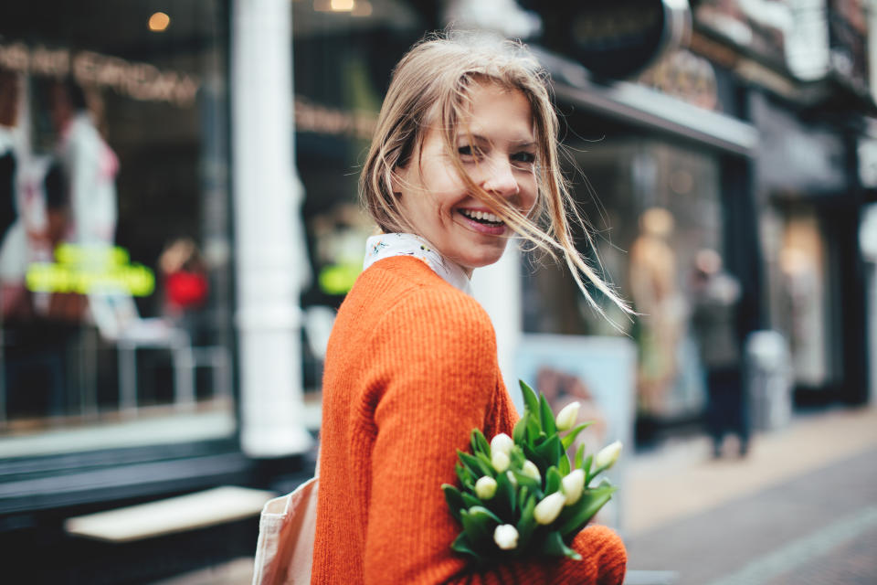 Dutch woman with tulips in Utrecht