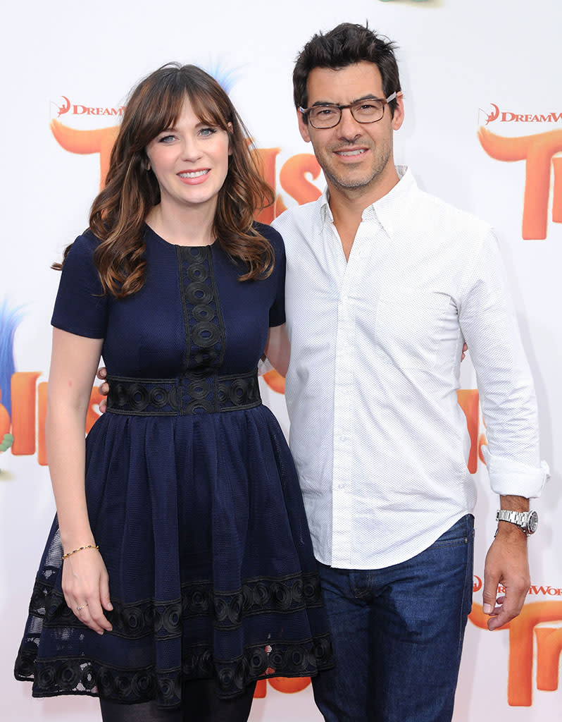 Zooey Deschanel and Jacob Pechenik attend the premiere of 'Trolls' in October. 