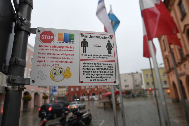 A sign reminding people to wear a mask is seen prior to an ordered lock-down due to the further spreading of the coronavirus disease (COVID-19) in Pfarrkirchen