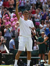 Bernard Tomic of Australia celebrates match point during the Gentlemen's Singles third round match against Richard Gasquet of France on day six of the Wimbledon Lawn Tennis Championships at the All England Lawn Tennis and Croquet Club on June 29, 2013 in London, England.