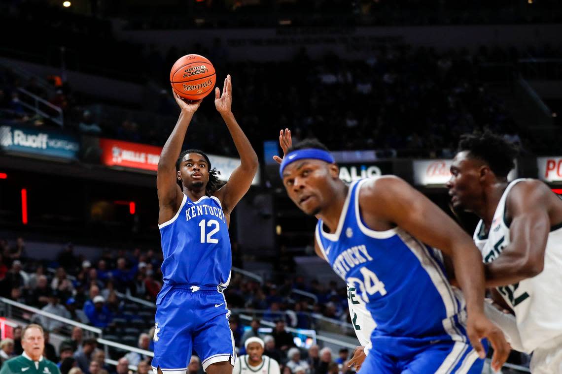 Kentucky’s Antonio Reeves (12) and backcourt mate CJ Fredrick (not pictured) found the going tough against Michigan State on Tuesday night. The pair combined to shoot 2-of-9 from three-point range and 3-of-14 overall.