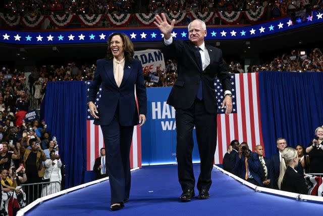 <p>BRENDAN SMIALOWSKI/AFP via Getty</p> Kamala Harris and Tim Walz appear together for the first time as running mates on Aug. 6, 2024