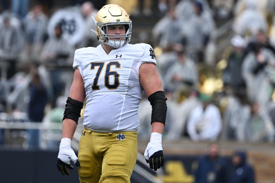 SOUTH BEND, INDIANA - APRIL 22: Joe Alt #76 of the Notre Dame Fighting Irish looks on during the Notre Dame Blue-Gold Spring Football Game at Notre Dame Stadium on April 22, 2023 in South Bend, Indiana. (Photo by Quinn Harris/Getty Images)