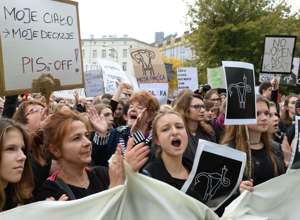 Polish women take part in a nationwide strike and demonstration to protest against a legislative proposal for a total ban of abortion on October 3, 2016 in Warsaw.

Thousands of women dressed in black protested across Poland in the 