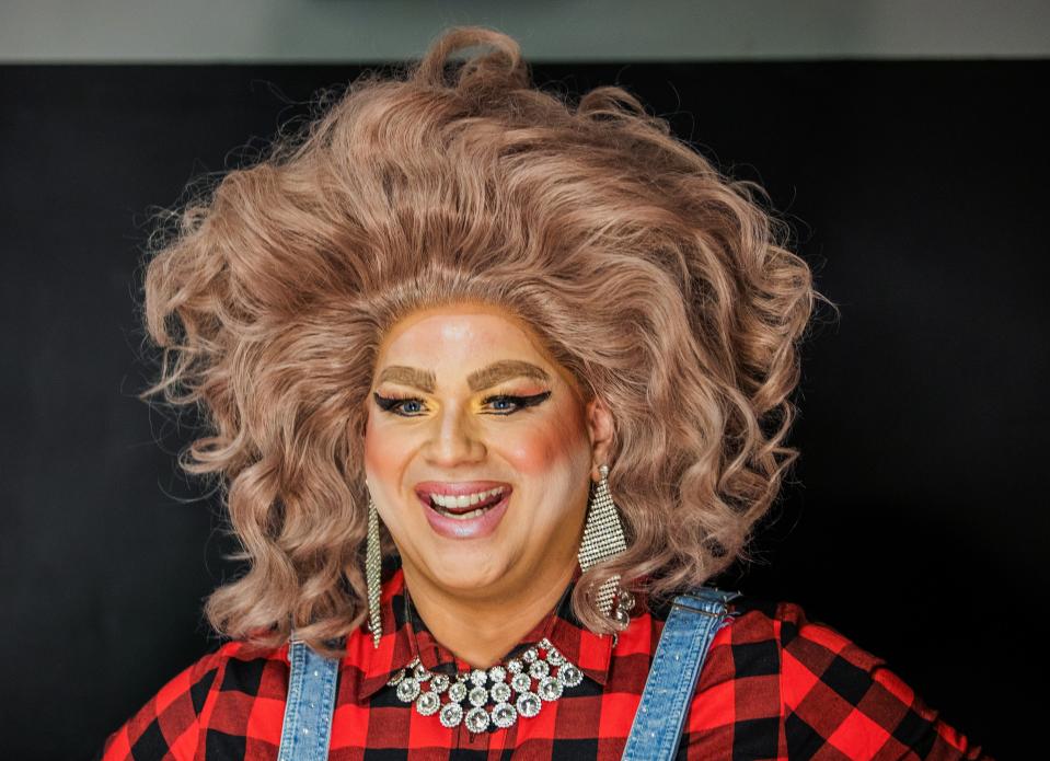 Drag queen May O'Nays poses for a picture in the dressing room before her performance at Play in Louisville on May 21, 2022.