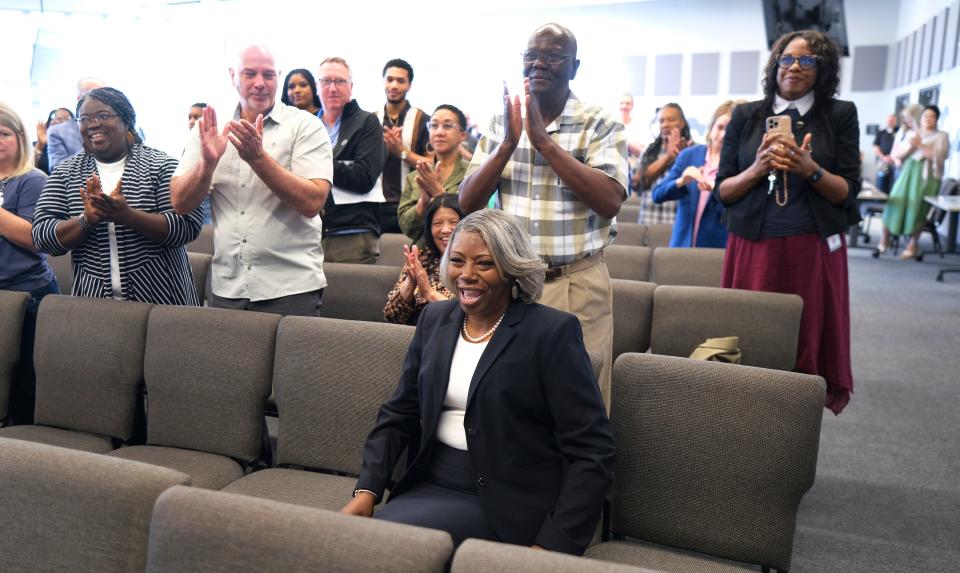 Jamie Polk receives a standing ovation after the May 11 meeting when she was unanimously selected as Oklahoma City Public Schools' next superintendent. Polk's new job starts July 1.