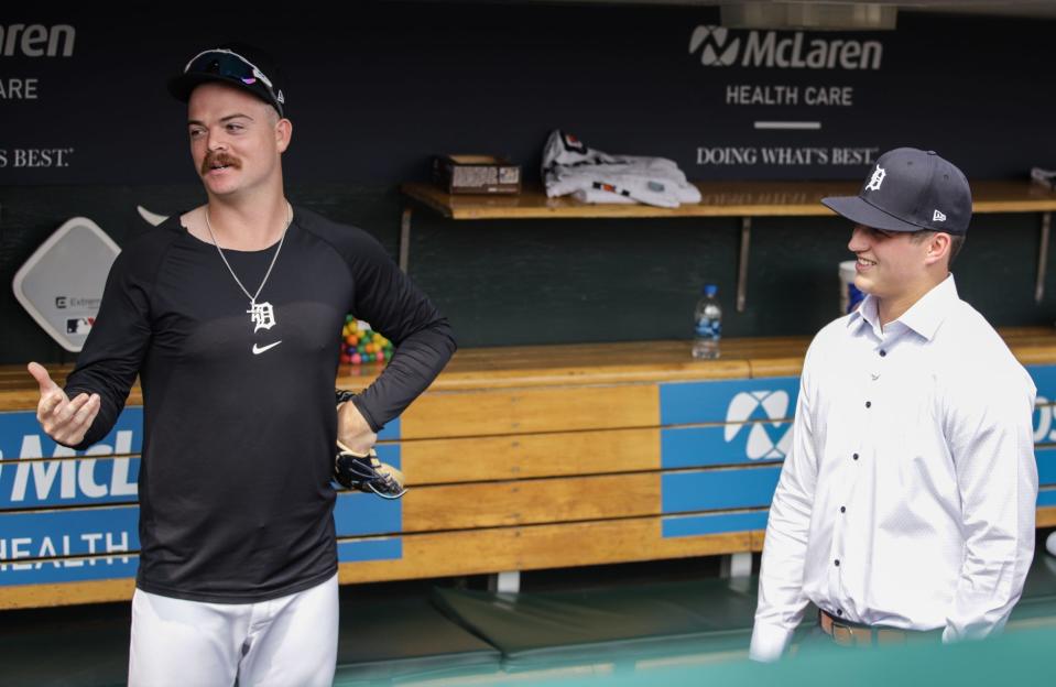 Jake Rogers and Ty Madden, just two guys from Texas, talkin' baseball in the Tigers dugout.