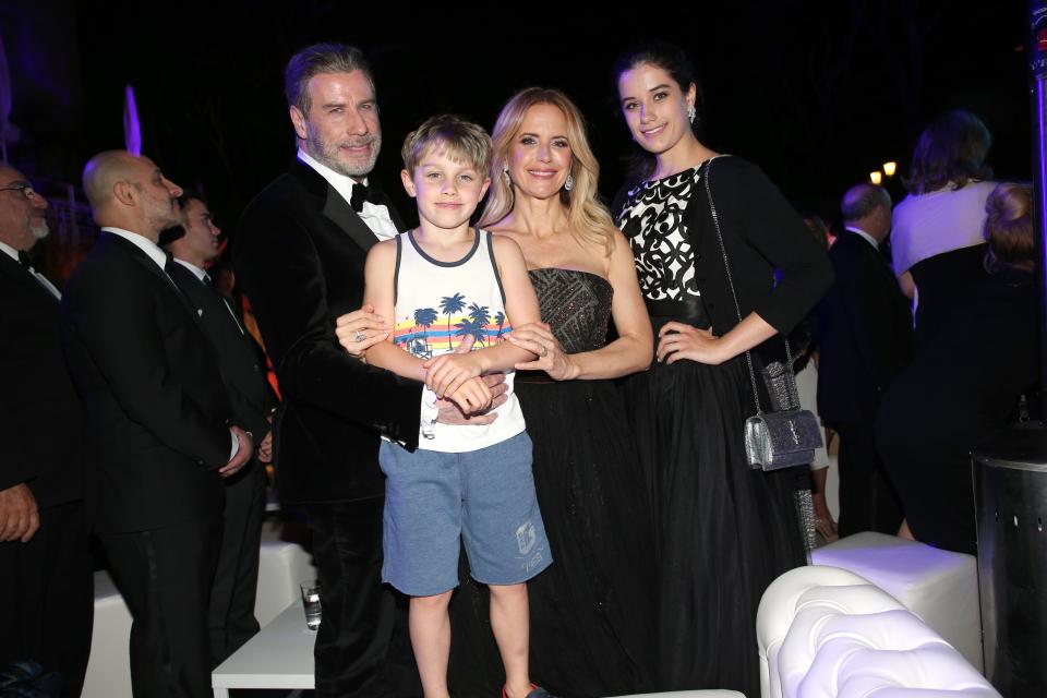 John Travolta and his wife Kelly Preston, daughter Ella Blue Travolta (R) and son Benjamin Travolta during the party in Honour of John Travolta's receipt of the Inaugural Variety Cinema Icon Award during the 71st annual Cannes Film Festival at Hotel du Cap-Eden-Roc on May 15, 2018 in Cap d'Antibes, France. (Photo by Gisela Schober/Getty Images)