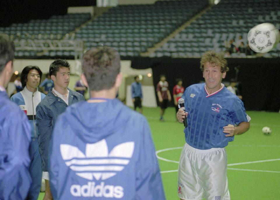 FILE - Zico, technical director of Japan's pro-football league's Kashima Antlers, right, gives a heading lecture to Japanese soccer fans during his training session in Tokyo on May 2, 1996. Cristiano Ronaldo is not the first soccer superstar to head off to one of the world’s supposed minor leagues in the latter years of his career. Many of soccer's biggest names like Pelé, Johan Cruyff, Zico, Xavi Hernandez and now the 37-year-old Ronaldo at Saudi Arabian club Al Nassr have found themselves prolonging their careers at unlikely soccer outposts usually for vast amounts of money. (AP Photo/Shizuo Kambayashi, File)