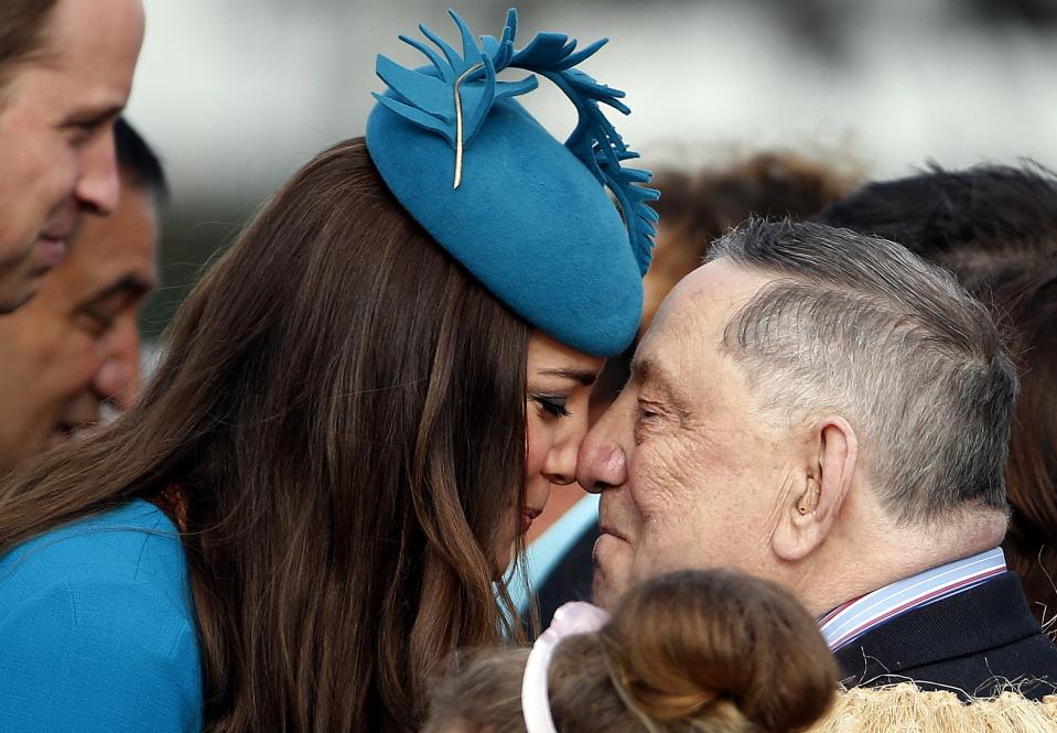 Catherine, the Duchess of Cambridge, receives a traditional Maori welcome called a "hongi" from David Ellison after she arrived with her husband, Britain's Prince William (L), in Dunedin April 13, 2014. Prince William and his wife are undertaking a 19-day official visit to New Zealand and Australia with their son, Prince George. REUTERS/Phil Noble (NEW ZEALAND - Tags: SOCIETY ROYALS TPX IMAGES OF THE DAY)