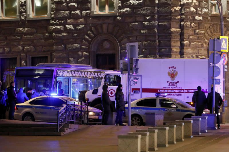 An ambulance is seen on the site of a shooting incident near the Federal Security Service (FSB) building in Moscow