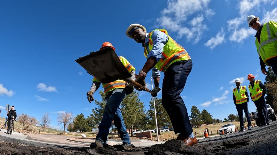 Colorado Springs Mayor Yemi Mobolade joined city crews in demonstrating the pothole repair process.