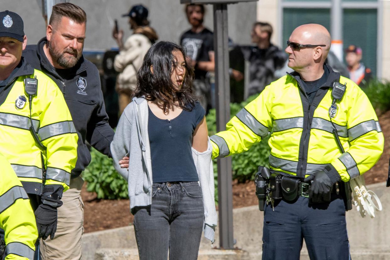 Massachusetts Institute of Technology (MIT) police arrest pro-Palestinian protesters for block the entrance of a parking garage at the Stata Center at MIT (AFP via Getty Images)