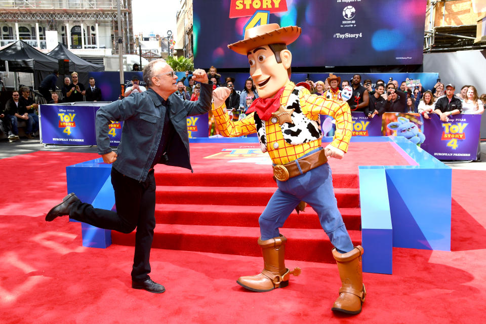 LONDON, ENGLAND - JUNE 16: Tom Hanks signs autographs as he attends the "Toy Story 4" European Premiere  at Odeon Luxe Leicester Square on June 16, 2019 in London, England. (Photo by Dave J Hogan/Getty Images)