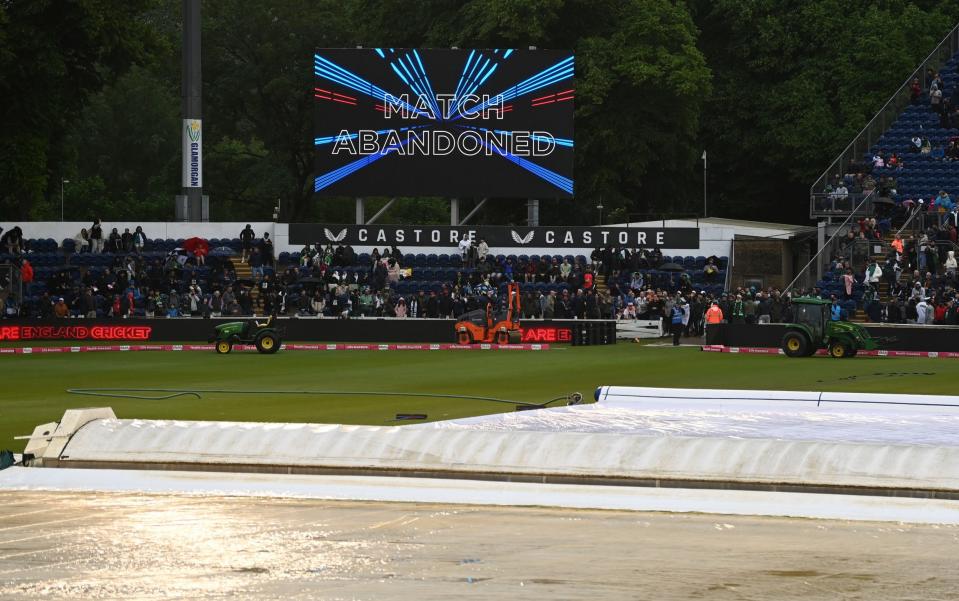 The big screen shows match abandoned in Cardiff