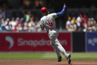 Philadelphia Phillies' Bryson Stott rounds the bases after hitting a two-run home run during the second inning of a baseball game against the San Diego Padres, Sunday, April 28, 2024, in San Diego. (AP Photo/Brandon Sloter)
