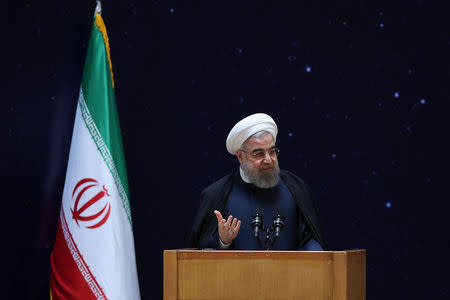 Iran's President Hassan Rouhani gestures as he speaks during a ceremony marking National Day of Space Technology in Tehran, Iran February 1, 2017. President.ir/Handout via REUTERS