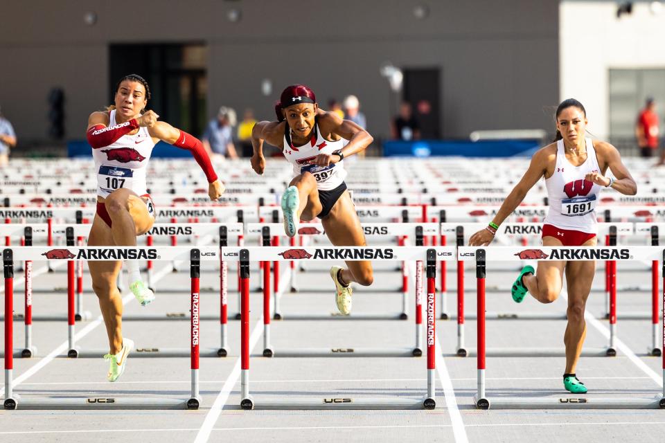 Texas Tech's Demisha Roswell, center, won her heat and posted the second-fastest qualifying time in the 100-meter hurdles Saturday at the NCAA West Preliminary in Fayetteville, Arkansas. Roswell advances to the NCAA outdoor championships June 8-11 in Eugene, Oregon.