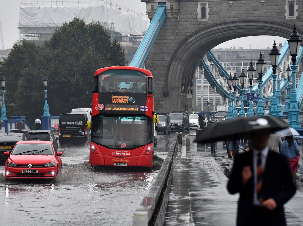 Flood warnings have been issued across London and south England  (AFP via Getty Images)