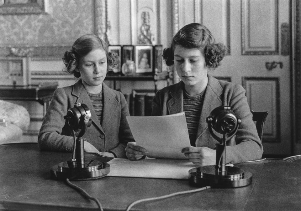 Princesses Elizabeth and Margaret make a broadcast to the children of the Empire during World War II on Oct. 10, 1940. (Topical Press Agency / Getty Images)