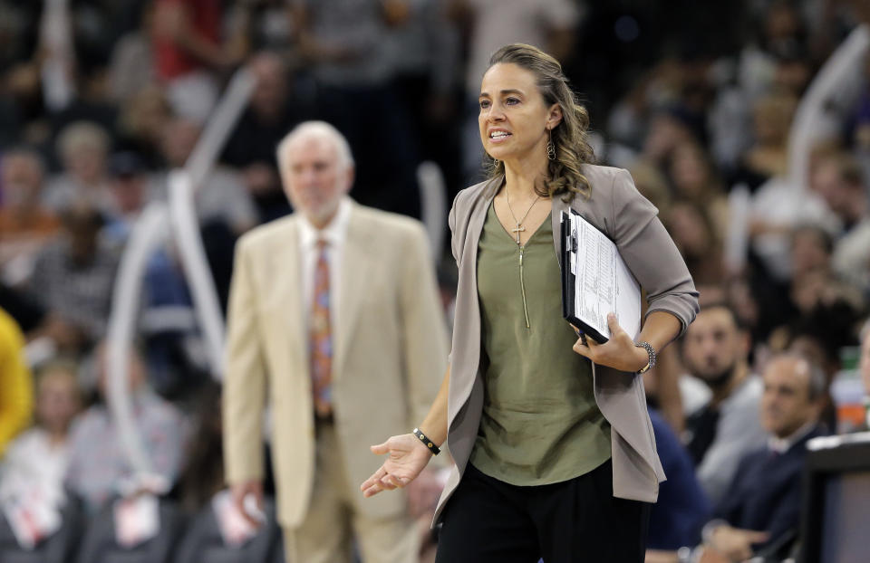 San Antonio Spurs assistant Becky Hammon has risen the NBA ranks despite the many roadblocks female coaches face. (AP)