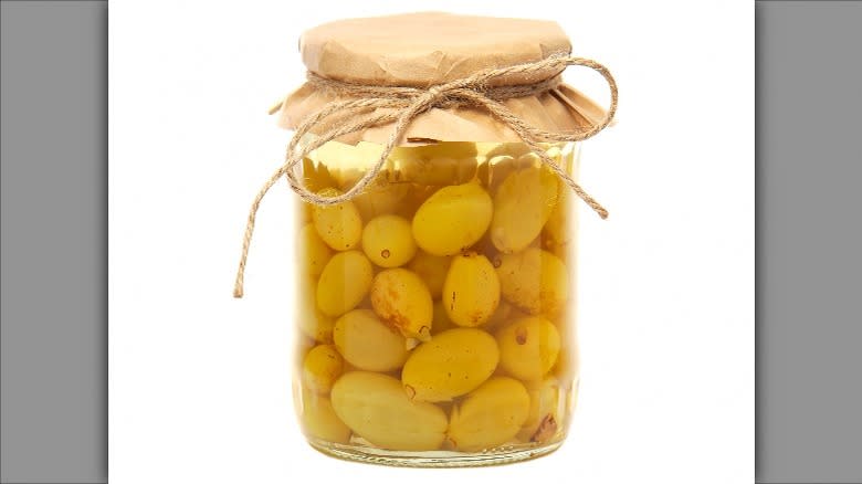 Jar of preserved grapes