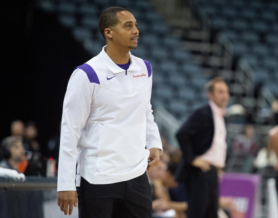 Evansville’s Head Coach David Ragland smiles after the University of Evansville Purple Aces score during their game against the Campbell University Camels at Ford Center in Evansville, Ind., Wednesday evening, Dec. 7, 2022. 