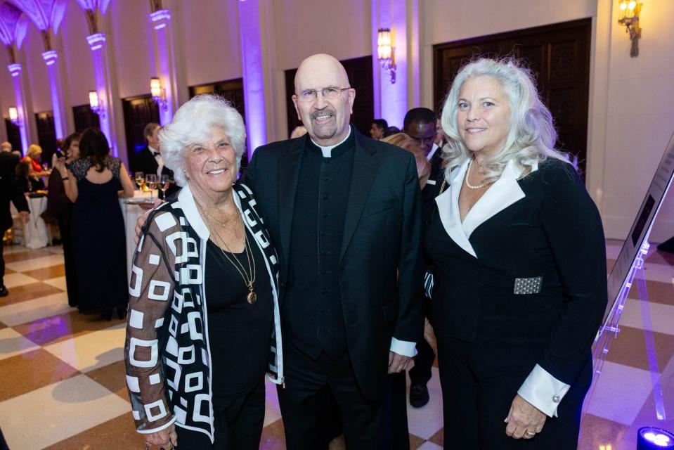 Judi Rutt, the Rev. Albert Dello Russo and Carol Spence