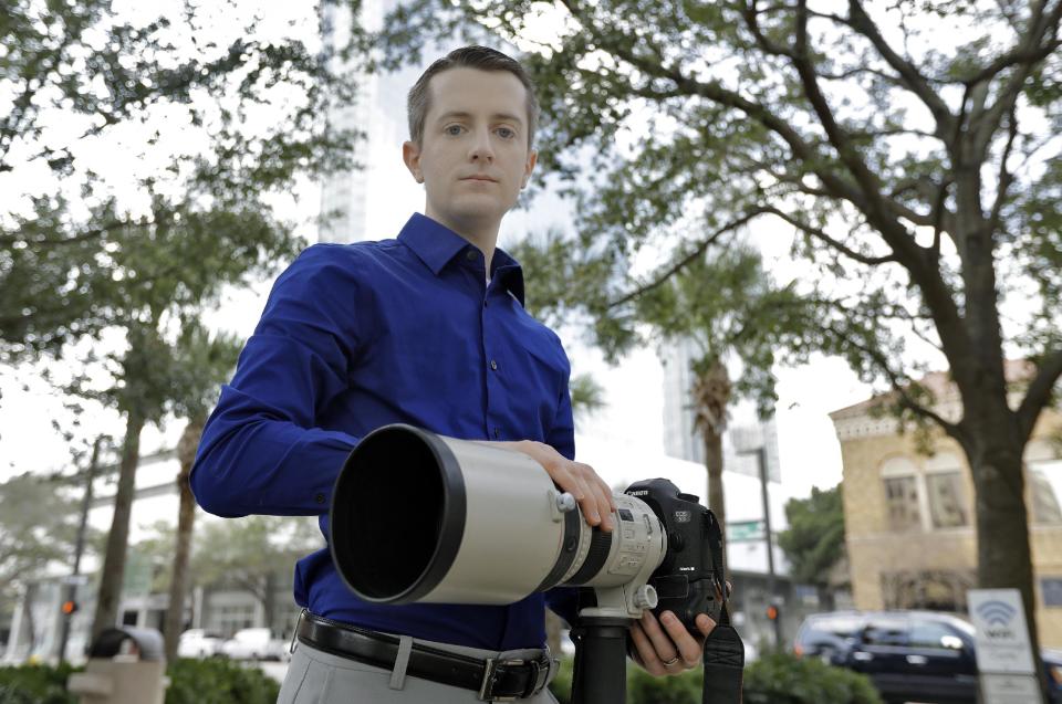 In this photo taken Feb 9, 2017, Mike Schwarz, sole proprietor of Mike Schwarz Photography, poses for a photo in Tampa, Fla. Schwarz is a self-employed business owner who buys his own health insurance. The subsidized coverage “Obamacare” offers provides him protection from life’s unpredictable changes and freedom to pursue his vocation, he says. (AP Photo/Chris O'Meara)