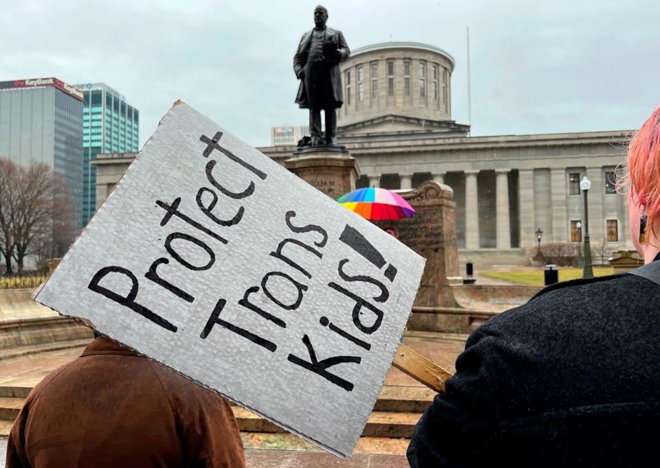 PHOTO: Protesters advocating for transgender rights and healthcare stand outside of the Ohio Statehouse, on Jan. 24, 2024, in Columbus, Ohio.  (Patrick Orsagos/AP, FILE)