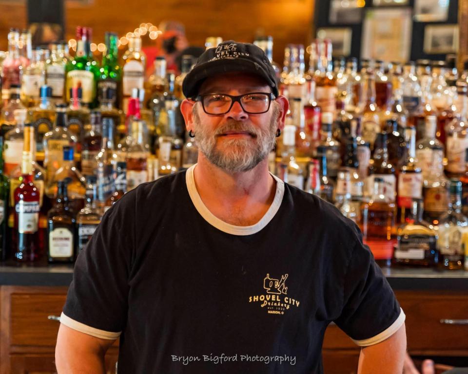 Scott Baldwin has been a bartender at Shovel City Drinkery since it opened in 2020. He says he considers himself more of a host to the bar's patrons.